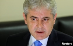 The head of Democratic Union for Integration, Ali Ahmeti, speaks during an interview for Reuters in Tetovo, Macedonia, March 7, 2017.