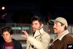 Jose Julian, director Chris Weitz and Demian Bichir on the set of "A Better Life"
