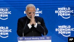 Prime Minister of India Narendra Modi greets the audience before his speech the World Economic Forum in Davos, Switzerland, Jan. 23, 2018.