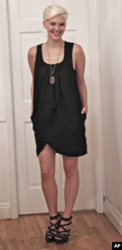 Heidi Hackerman modeling one of the six pieces of clothing she wore for a month.