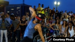 D.C. Bike Party riders often take a break at parks or open areas, where they listen to music and dance.