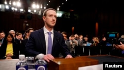 Facebook CEO Mark Zuckerberg arrives to testify before a Senate Judiciary and Commerce Committees joint hearing regarding the company’s use and protection of user data, on Capitol Hill in Washington, April 10, 2018.