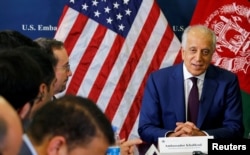 U.S. special envoy for peace in Afghanistan, Zalmay Khalilzad, talks with local reporters at the U.S. embassy in Kabul, Afghanistan, Nov. 18, 2018.