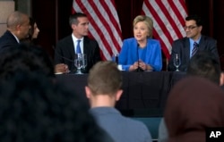 FILE - Democratic presidential candidate Hillary Clinton participates in a roundtable with Muslim community leaders at the University of Southern California in Los Angeles, March 24, 2016.