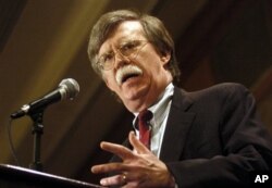 FILE - John Bolton, the U.S. ambassador to the United Nations, speaks to the Baltimore Council on Foreign Affairs in Baltimore, May 19, 2006.