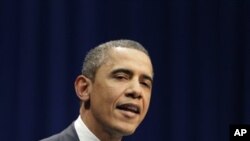 President Barack Obama speaks at a memorial service for the victims of Saturday's shootings at McKale Center on the University of Arizona campus Wednesday, Jan. 12, 2011, in Tucson, Ariz.