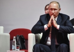 Russian President Vladimir Putin attends judo tournament on the sidelines of the Eastern Economic Forum in Vladivostok, Russia, Sept. 5, 2019.