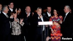 Hungarian Prime Minister Viktor Orban addresses supporters after the announcement of the partial results of parliamentary election in Budapest, April 8, 2018.