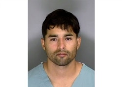 FILE - This June 7, 2020, booking photo from the Santa Cruz County Sheriff's Office shows Steven Carrillo. The FBI charged Air Force Staff Sgt. Carillo with murder in the fatal shooting of David Patrick Underwood.