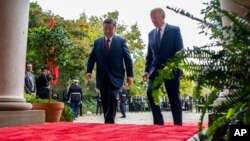 资料照片: 2023年11月15日拜登总统于在加利福尼亚州伍德赛德的费罗丽庄园会见中国国家主席习近平