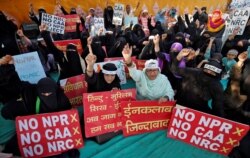 Demonstrators shout slogans during a protest against a new citizenship law, in Ahmedabad, India, March 3, 2020.