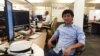Tang Kengsreng, 29, is software engineer works at his desk at the headquarters of Cisco Systems, a technology company, in San Jose, September 1, 2016. Originally from Cambodia’s Thbong Khmum province, Kengsreng has been working in Silicon Valley for over two years and is one of the few young professionals from Cambodia who have made it to the world’s technology capital. (Sophat Soeung/VOA Khmer) 