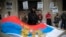 FILE - A protester waves Russia's presidential flag during a demonstration outside Ukraine's consulate in New York May 8, 2014.