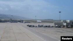 FILE - A passenger aircraft taxis after landing at Beirut airport, Lebanon, March 16, 2016. 