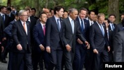 Yevropa Komissiyasi Prezidenti Jan Klod Yunker, Kanada Bosh vaziri Jastin Tryudo, Amerika Prezidenti Barak Obama, Britaniya Bosh vaziri Deyvid Kameron va Yevropa Kengashi Prezidenti Donald Tusk Yaponiyadagi sammitda. 26-may, 2016-yil.