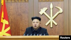 FILE - North Korean leader Kim Jong Un delivers a New Year's address.
