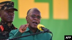 FILE - In this Aug. 29, 2020 photo, Tanzania's President John Magufuli speaks during a campaign event in Dodoma, Tanzania. Magufuli has not been seen in public in almost two weeks, raising concerns about his health.