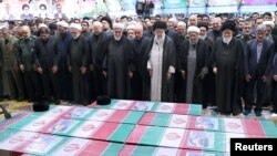 Iranian Supreme Leader Ayatollah Ali Khamenei performs prayer at a funeral for victims of a helicopter crash that killed Iranian President Ebrahim Raisi, Foreign Minister Hossein Abdollahian and others, in Tehran, Iran, May 22, 2024. (West Asia News Agency via Reuters)