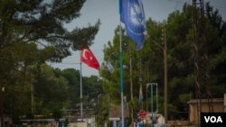 Darbasiyah lies right on the border with Turkey, and some locals fear it will meet the same fate as Ras al-Ayn, another city governed by Kurds that is now held by Turkish-backed fighters, in Darbasiyah, Oct. 22, 2019. (VOA/Yan Boechat)