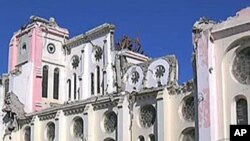 Port-au-Prince's faithful attend a somber Mass Sunday at the main cathedral since the devastating earthquake