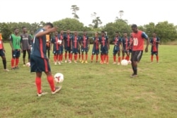 Shooting Stars Football Club players show off their footwork after training in Ghana's capital, Accra, Oct. 8, 2019. (Stacey Knott/VOA)
