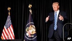 President Donald Trump arrives to speak to the Major County Sheriffs' Association and Major Cities Chiefs Association, Feb. 8, 2017, in Washington.