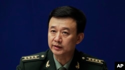Juru bicara Kementerian Pertahanan China Kolonel Wu Qian memperingatkan India (foto: dok). 