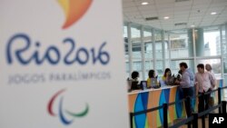 Point de vente des billets pour les JO à Rio de Janeiro. (AP Photo/Silvia Izquierdo)