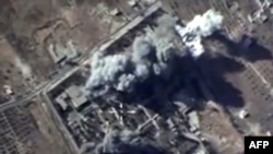 An Oct.12, 2015, image grab from a video made available on the Russian Defense Ministry's official website, purports to show explosions resulting from Russian airstrikes against targets in the Syrian province of Idlib.