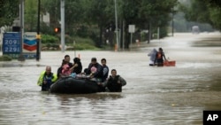 Climate experts say there will be increased severe storms and flooding such as this in Louisiana if more is not done to control the warming of the plant.