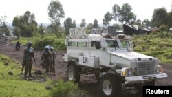 FILE - U.N. peacekeepers patrol the streets of Goma, Democratic Republic of Congo, Dec. 2, 2015.