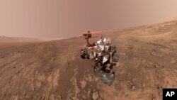 This composite image made from a series of Jan. 23, 2018 photos shows a self-portrait of NASA's Curiosity Mars rover on Vera Rubin Ridge. (NASA/JPL-Caltech/MSSS via AP)