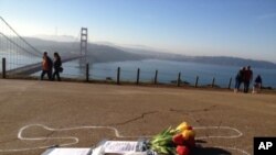 A chalk outline of a body is seen near the Golden Gate bridge in San Francisco.