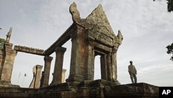 FILE - A Cambodian temple security guard stands at Preah Vihear temple, Cambodia, file photo. 