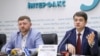 Dmytro Razumkov (R) and Oleksandr Korniyenko, leaders of Ukrainian President Volodymyr Zelenskiy's political party Servant of the People, speak at a news conference in Kyiv, Ukraine, May 27, 2019.