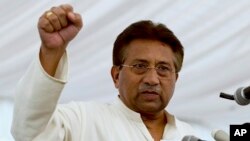 FILE - Pakistan's former President and military ruler Pervez Musharraf addresses his party supporters at his house in Islamabad.