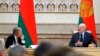 Belarusian President Alexander Lukashenko, right, delivers a speech as Chairman of the Munich Security Conference Wolfgang Ischinger, left, looks on during the Munich Security Conference Core Group meeting in Minsk, Oct. 31, 2018. 