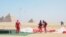 Skydivers say they hope the competition at Egypt's famed Great Pyramids will bring in more visitors after a $1.3 billion drop in tourism revenue over the past few months, March 2, 2016. (H. Elrasam/VOA)