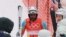 Skier Shannon Ogbnai-Abeda of Eritrea reacts after completing his run during the men's giant slalom event at the Winter Olympics, Feb. 13,2022.
