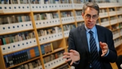 FILE - Human Rights Watch Executive Director Kenneth Roth speaks during an interview in Berlin, Germany, Jan. 16, 2019.