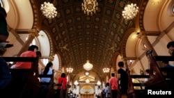 Catholics pray in Santa Cruz Church, ahead of Pope Francis' visit to Thailand, in Bangkok, Thailand November 17, 2019. Picture taken on November 17, 2019.