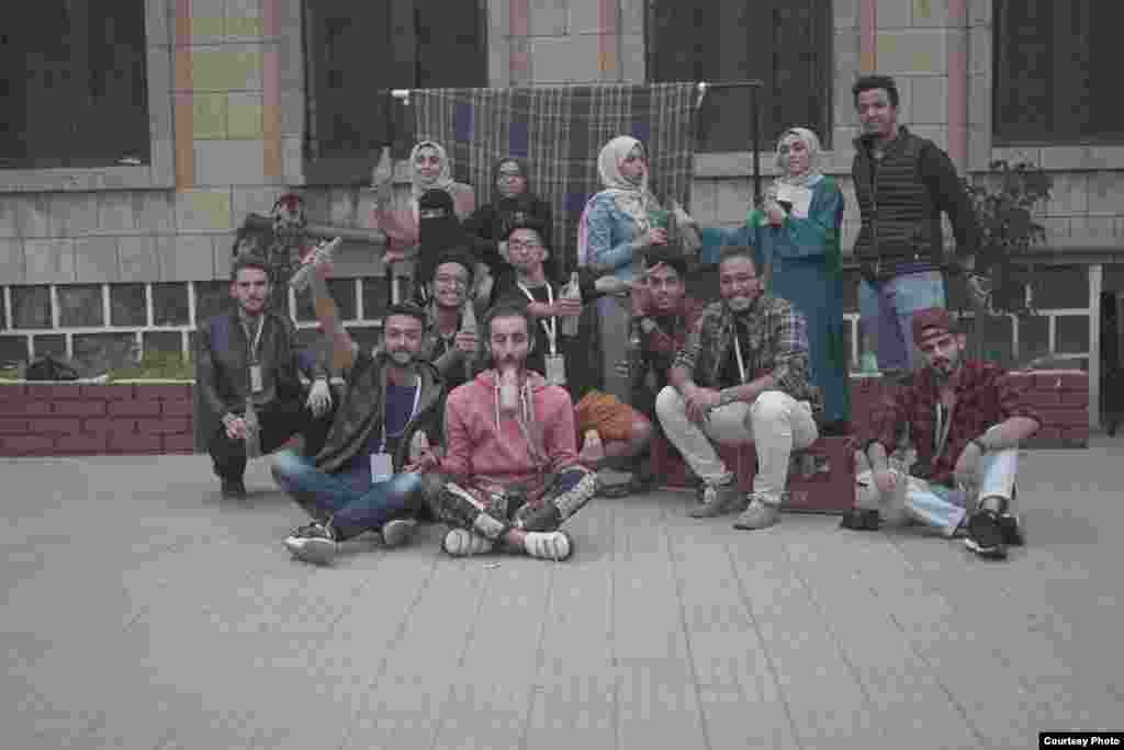 Members of Yemen Used to Be, which is a local volunteer initiative dedicated to documenting art and history of Yemen beyond war. (Photo courtesy of Waleed al-Ward) 