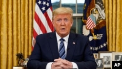 Le président Donald Trump, lors de son discours à la nation dans le bureau ovale de la Maison Blanche au sujet du coronavirus, le mercredi 11 mars 2020 à Washington. (Doug Mills / The New York Times via AP, Pool)