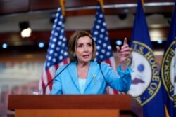 FILE - Speaker of the House Nancy Pelosi, D-Calif., talks to reporters at the Capitol in Washington, June 17, 2021.
