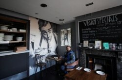 Andreas Spahiu, owner and manager of Don Vito's restaurant, is seen inside his premise, which is closing at the weekend due to the coronavirus restrictions, in Newcastle upon Tyne, Britain, Oct. 7, 2020.
