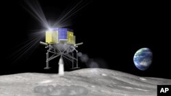 Gambar rekaan artis ini dipublikasikan oleh Japan Aerospace Exploration Agency, atau JAXA, 20 April 2015, dan menunjukkan mesin eksplorasi antariksa yang diberi nama SLIM (Smart Lander for Investigating Moon) mendarat di bulan.