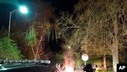 FILE - Portland police line up in downtown Portland, Ore., April 12, 2021, in this photo released by Portland Police Bureau. A crowd gathered in Portland on April 16, 2021, to protest the fatal shooting of a man by police earlier that day in the city.