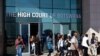 Banners and a rainbow flag are placed on the pavement outside the High Court in Gaborone, June 11, 2019. 
