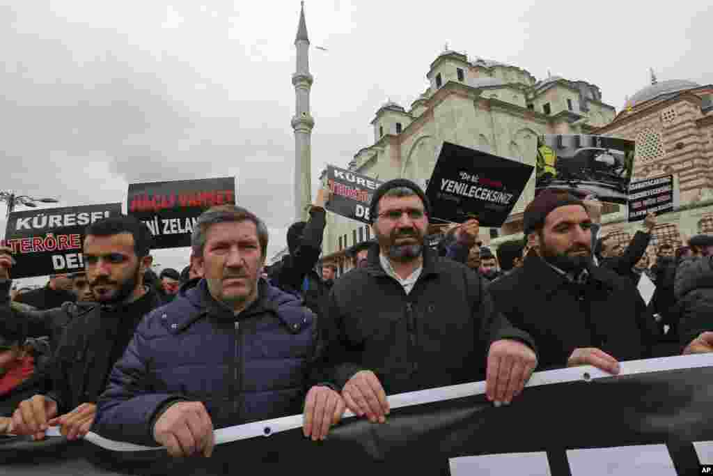 Demonstrators march after the mosque attacks in New Zealand, during a protest in Istanbul, March 15, 2019. 