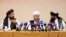 From left, Mohammad Naim, Mawlawi Shahabuddin Dilawar and Suhil Shaheen, members of a political delegation from the Afghan Taliban's movement, attend a news conference in Moscow, July 9, 2021.